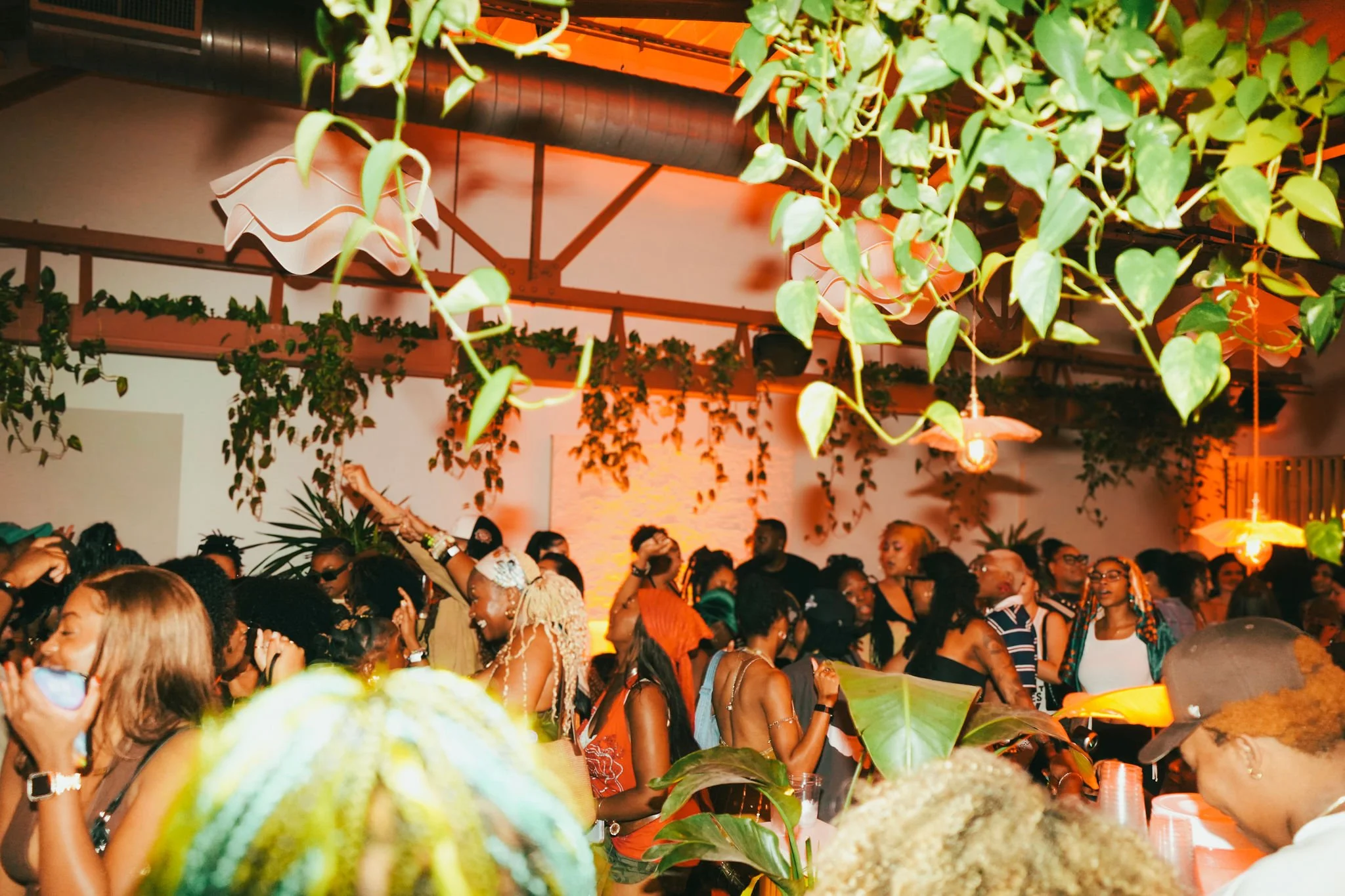 Live event crowd with stage and lighting